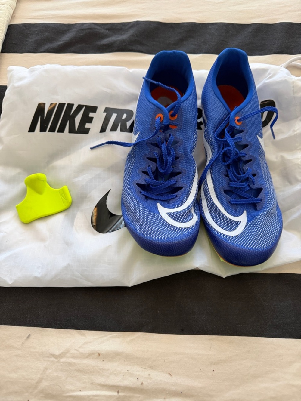 Nike Blue Racing Spikes with White Swoosh